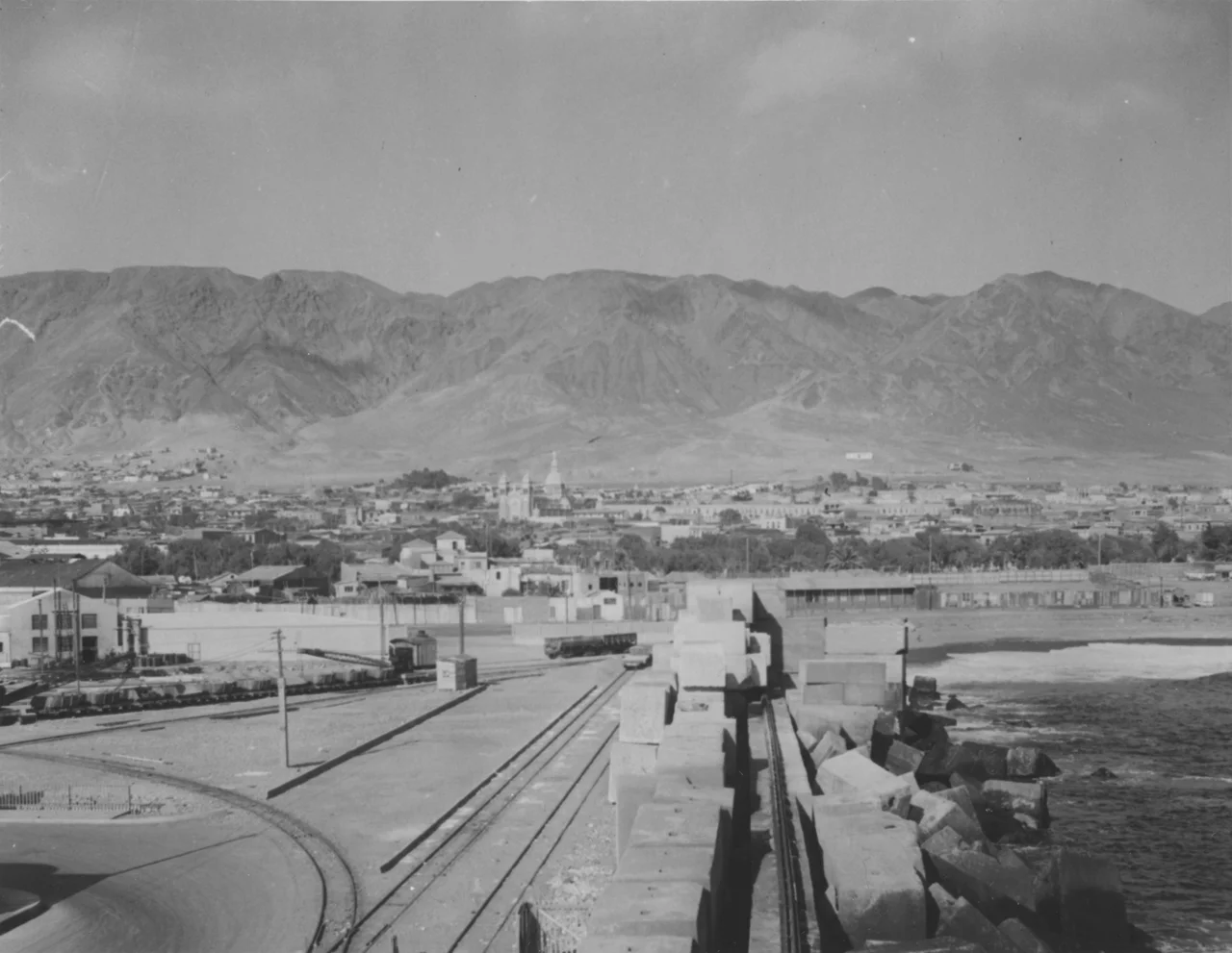 Montage of Antofagasta, Antofagasta Region, Republic of Chile. Description:
1º row: View of downtown Antofagasta.
2º row: Old Antofagasta Customs House building, Beach of Antofagasta, &amp; Hand of the Desert, sand sculpture in Atacama desert.
3º row: Sailboats, and Plaza Colón clocktower with Antofagasta Cathedral.
4º row: La Portada Natural Monument, Panorama of North Antofagasta, &amp; Ruins of Huanchaca.