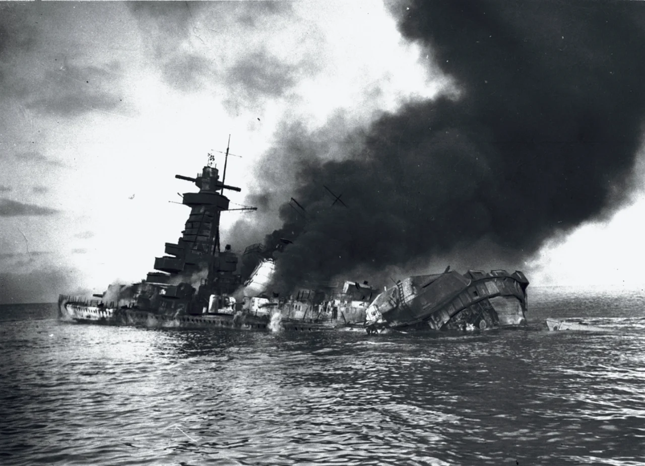 Description: German w:heavy cruiser Admiral Graf Spee scuttled in w:Montevideo harbor following the w:Battle of the River Plate in December 1939.
