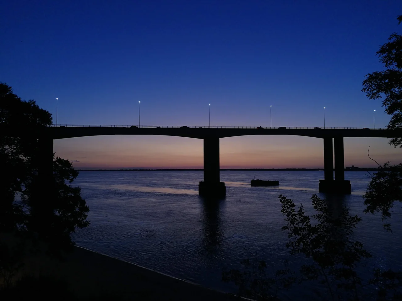 This is a picture of the Belgrano Bridge during the sunset.
