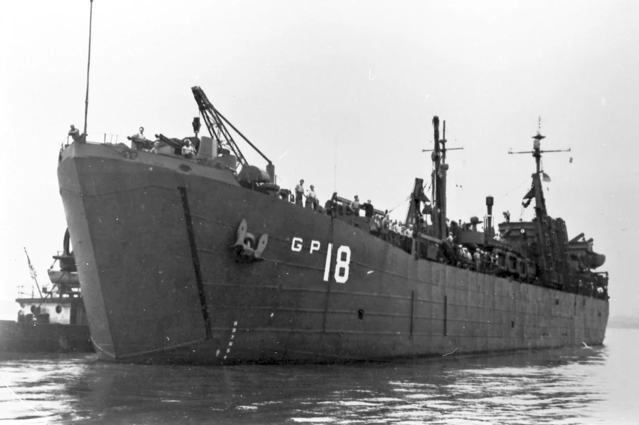 The U.S. Navy motor torpedo boat tender USS Chiron (AGP-18), circa in 1945. She is painted in Camouflage Measure 21.