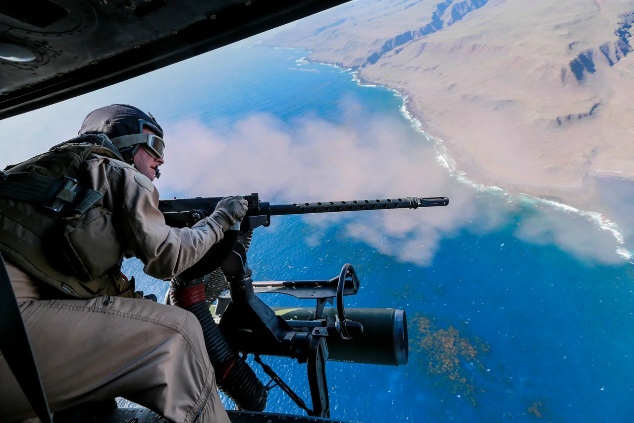 A Marine engages targets from a UH-1Y Venom with Marine Medium Tiltrotor Squadron 161, 15th Marine Expeditionary Unit, during Composite Training Unit Exercise (COMPTUEX) above San Clemente Island, California, March 20, 2015. COMPTUEX gives the Marines of VMM-161 the opportunity to practice real-world scenarios and hone their skill sets.
(U.S. Marine Corps photo by Sgt. Jamean Berry/Released)