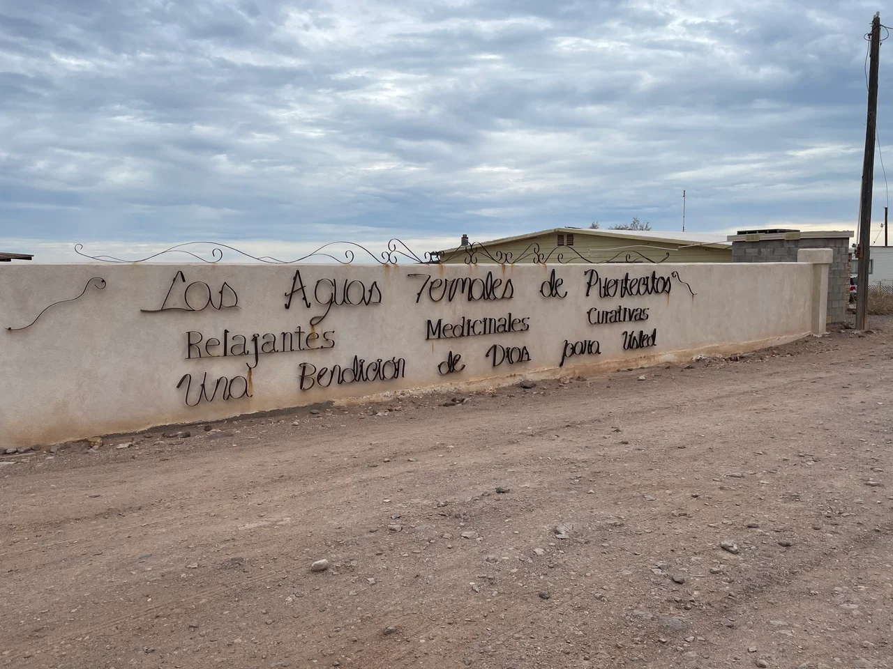 Sign for the hot springs in Puertecitos, Baja California
