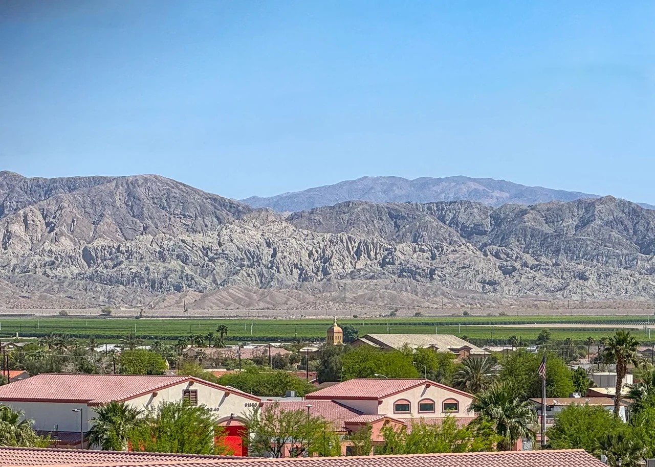 Mecca, California, Agricultural fields and Mecca Hills in the distance. This image was captured in the Imperial/Lower Coachella Valleys EPA Level IV Ecoregion (81f) and faces the Mecca Hills which pertain to the Upper Coachella Valley and Hills EPA Level IV Ecoregion (81e). In One Earth's ecoregion framework, this image captures the Sonoran Desert Ecoregion.