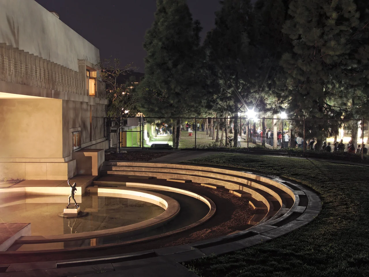Lighted ornamental pool at the re-opening of Hollyhock House in 2015. The 24-hour event drew large crowds, waiting in line for hours for admittance (visible in background).