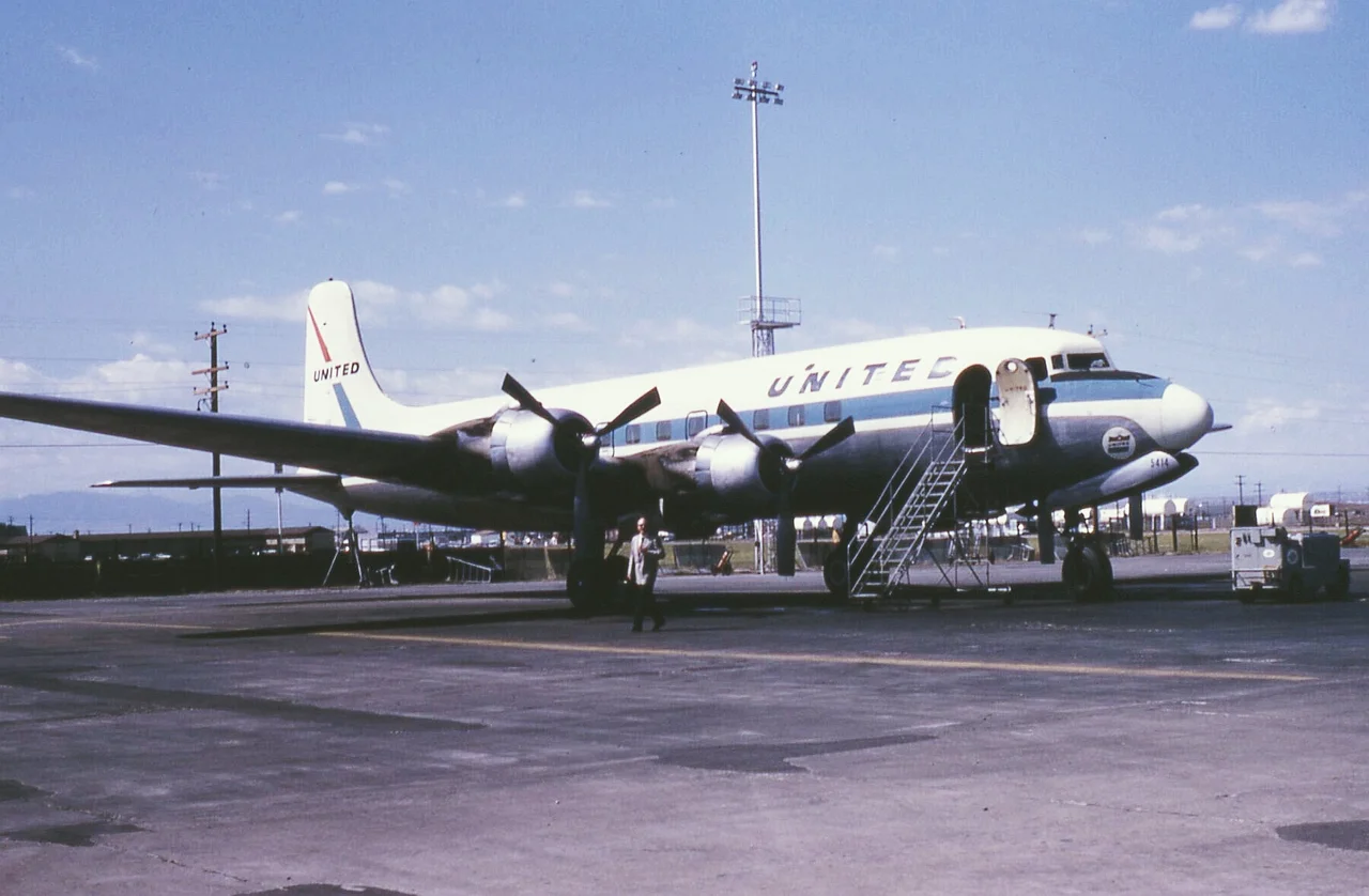 United Airlines DC-6, N37514, fleet code 5414, parked on the northwest ramp of the old Stapleton Airport, in Denver, CO, in September, 1966. Taken with 35mm Ektachrome film.