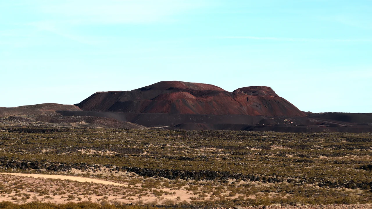 Pisgah crater/cinder cone is directly south of alongside route 66 and is 10 miles west of Ludlow California and about 30 miles southeast of Barstow California. The volcanic cone and basalt field is directly against an ancient ice age lake "Lavic Lake" The entire southern area of the cone and beyond is a marine corps gunnery range.