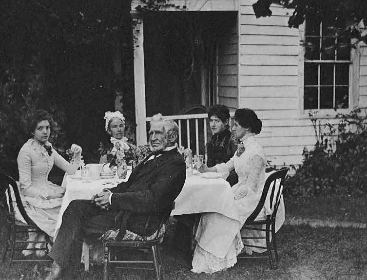 Camden House in 1880 with Charles and Philena and their three daughters at afternoon tea. Camden House is now part of the Tower House Historic District.