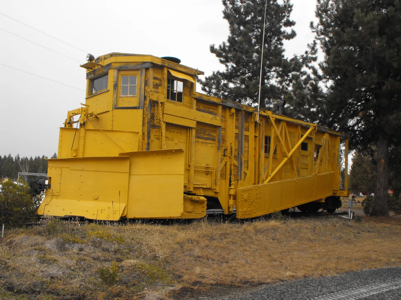 Antique wooden Flanger, former Southern Pacific Railroad SP MWx Flanger, used to remove snow from between the railroad tracks, now on display at Train Mountain Railroad Museum at Chiloquin, Oregon.