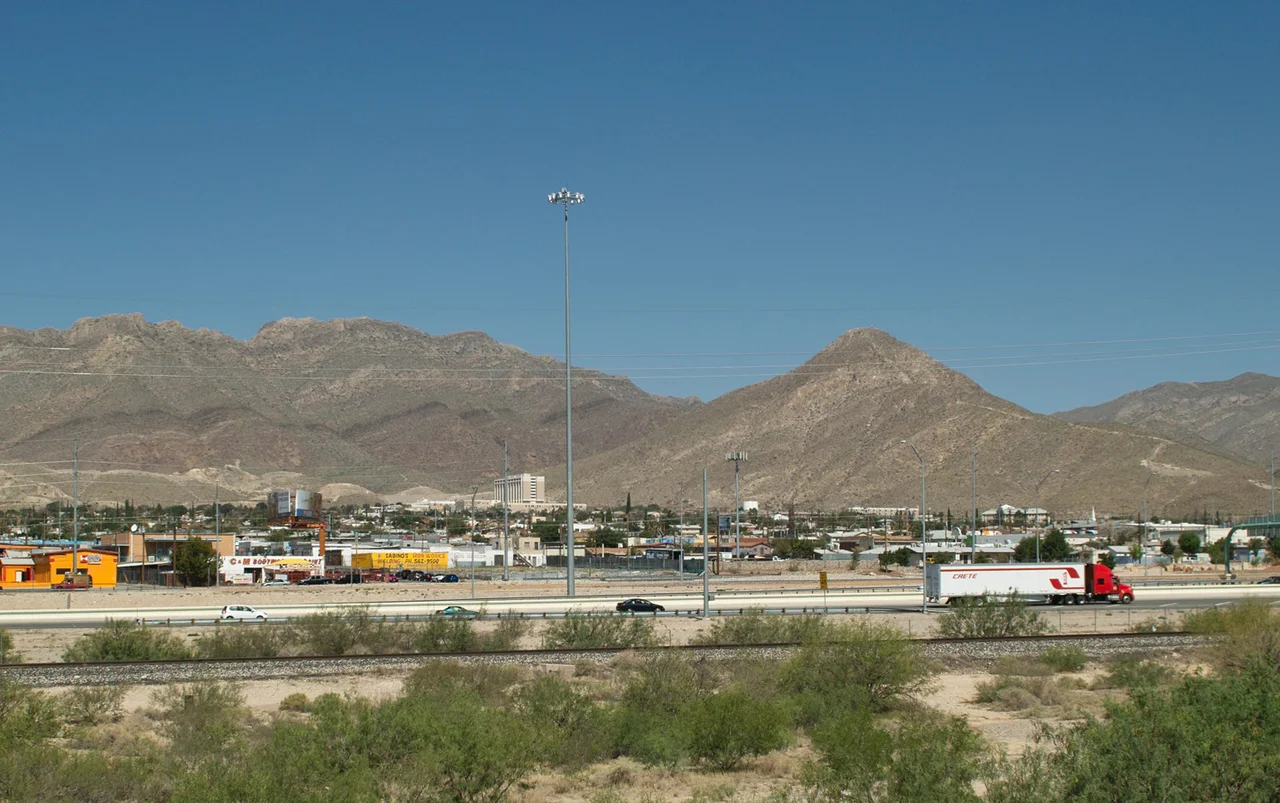 A view of Sugarloaf Mountain, El Paso, Texas, taken to match the view at File:Camping on the Border, near El Paso, Texas.jpg, from near the Cassidy Road entrance to Fort Bliss, July 2012