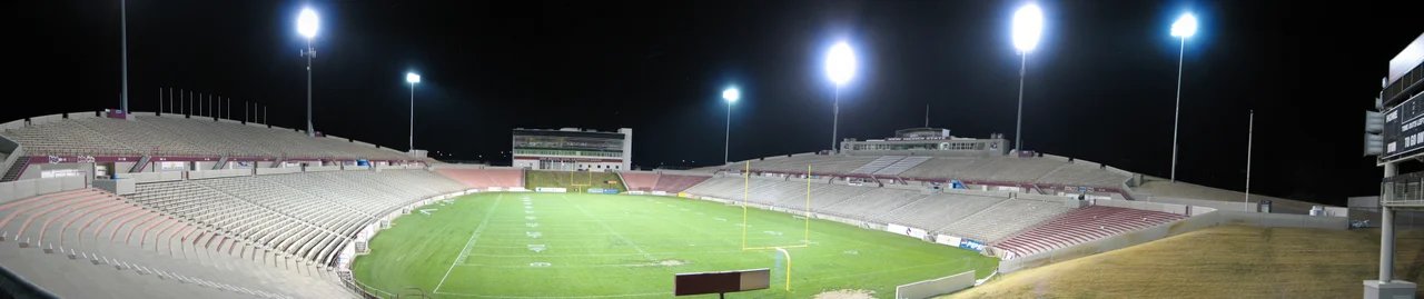 Panoramic photo of Aggie Memorial Stadium, New Mexico State University, at night