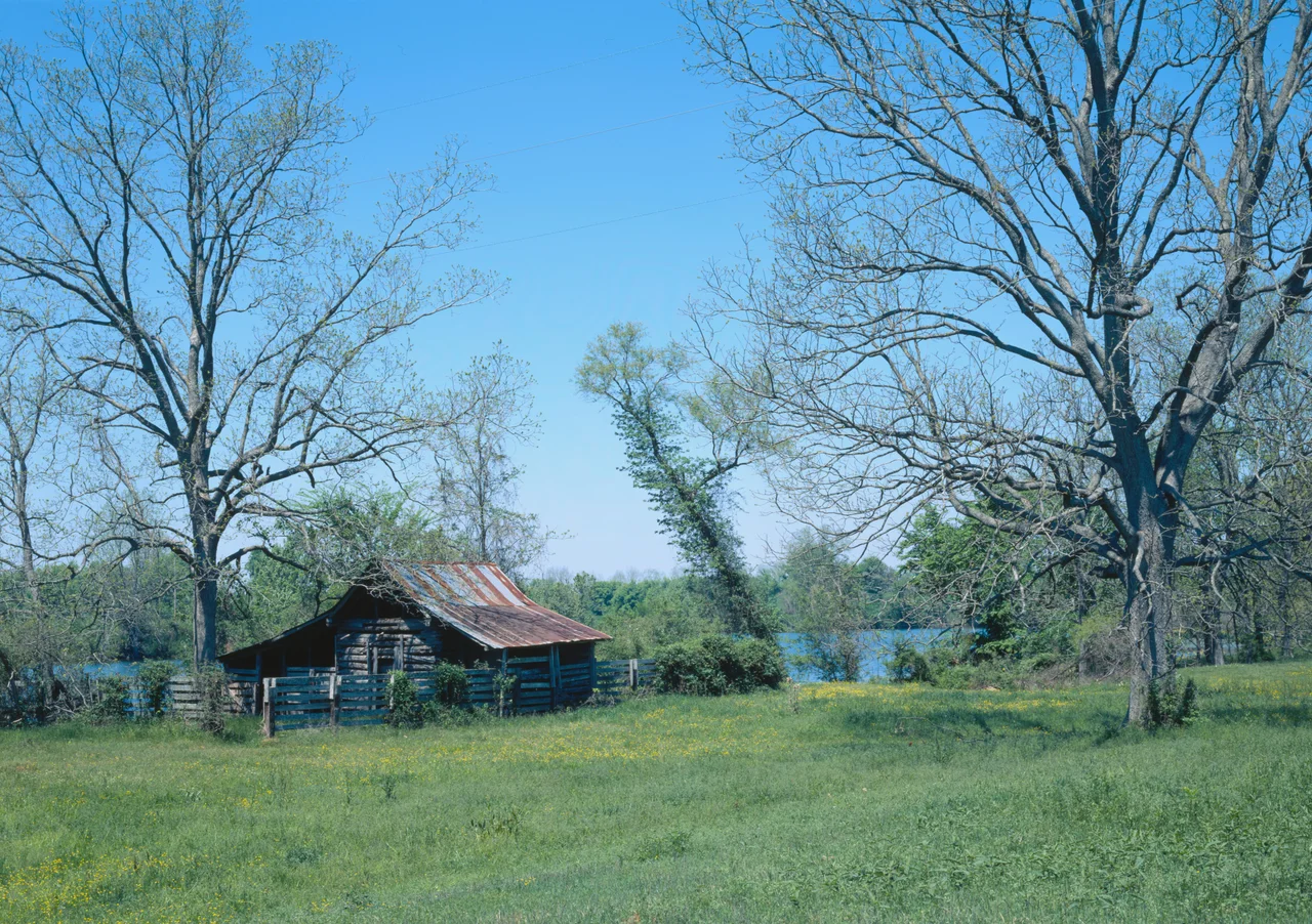 Log house in the Cane River Creole National Historical Park, located near Natchez in Natchitoches Parish, Louisiana, United States.  The park is listed on the National Register of Historic Places.