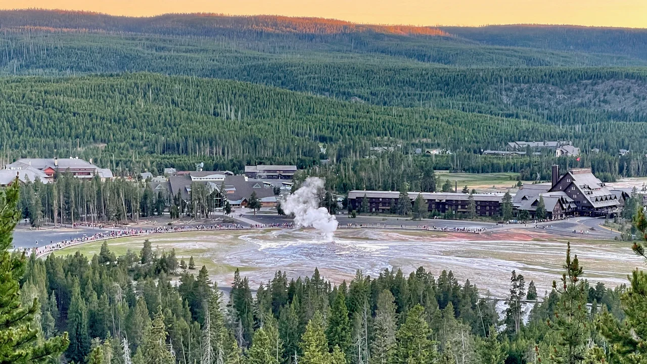 View from Observation Point of Old Faithful, the Old Faithful Inn, and other buildings in the Old Faithful Historic District,  Wyoming.