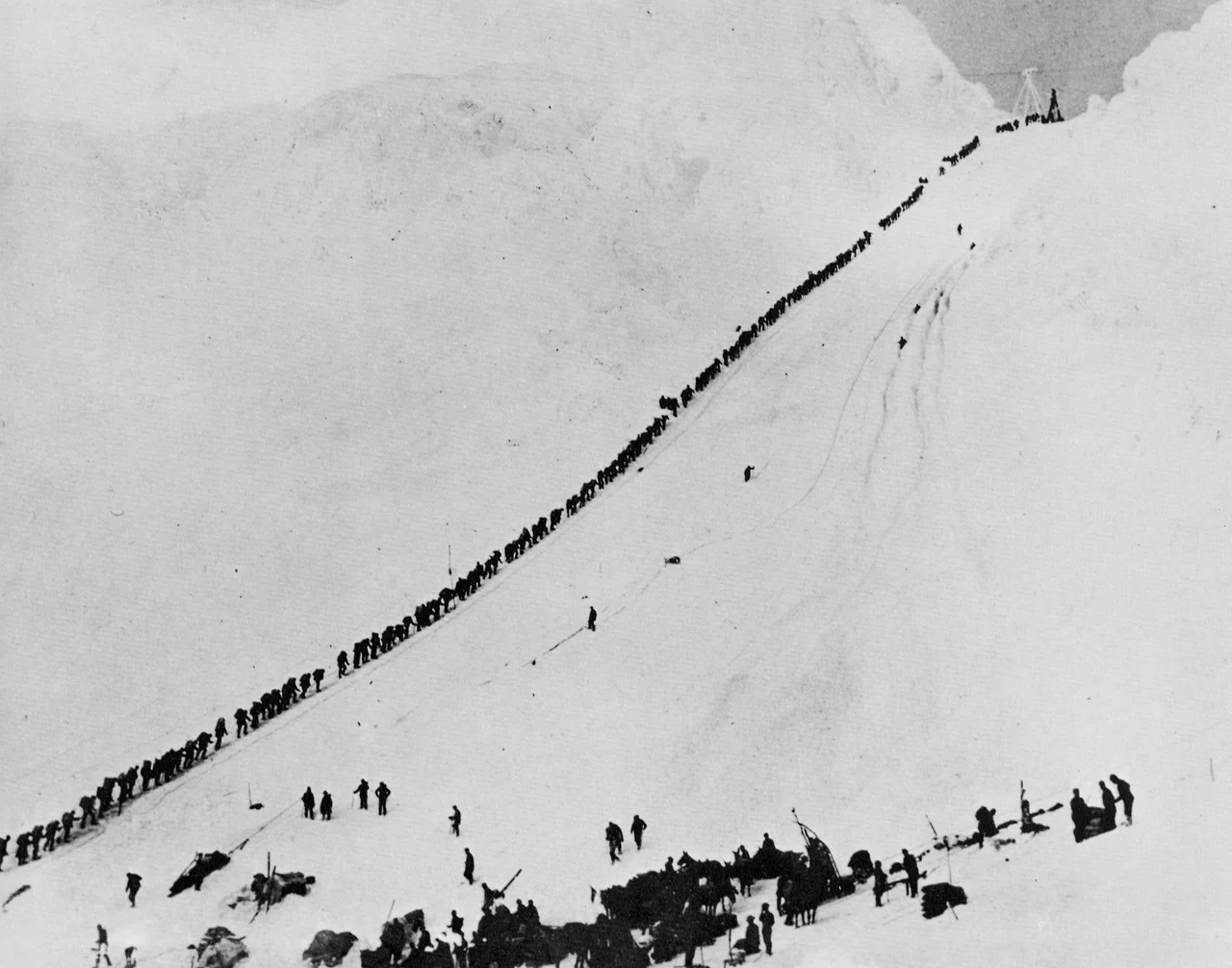 Possibly of the Dyea-Klondike Transportation Company.                                                Caption on image: "Power house showing tramway in operation, Dyea Trail"                                                Original image in Hegg Album 1, page 17.                                                Original photograph by Eric A. Hegg 84; copied by Webster and Stevens 20.A.
Subjects (LCTGM): Aerial tramways--Alaska; Trails--Alaska; Power plants--Alaska
Subjects (LCSH): Chilkoot Trail
