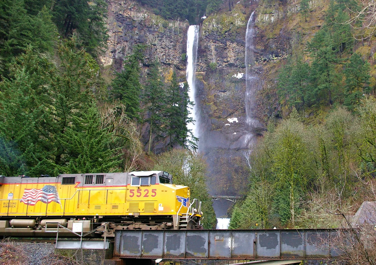 UP 5525 heading towards Portland, OR in the Columbia River Gorge at Multnomah Falls.  I'm sure similar shots to this one have been on the UP calendar in years past.