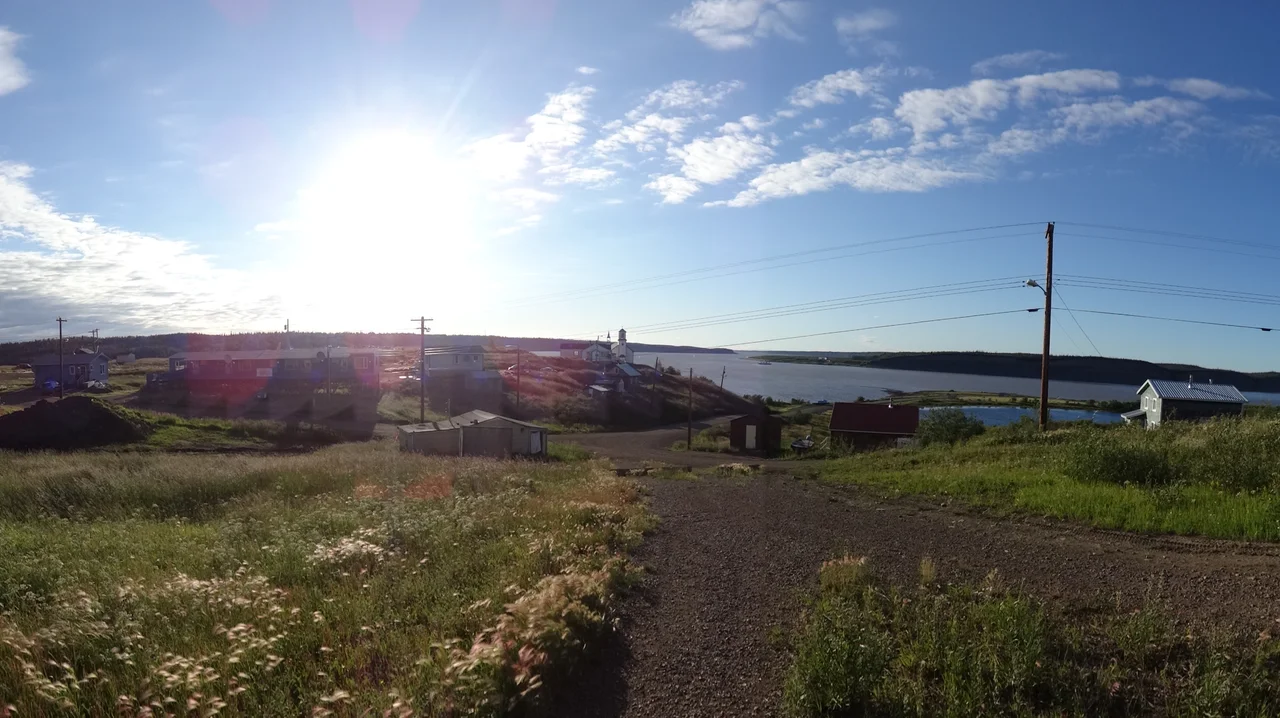 A view of the Church in Tsiigehtchich, NWT with the Arctic Red River and the MacKenzie River in the Background