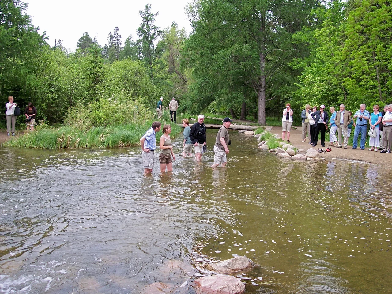 Headwaters of the Mississippi River. Above the rocks is the north end of Minnesota's Lake Itasca, which begins the flow of the Mississippi River to its eventual end point in the Gulf of Mexico.