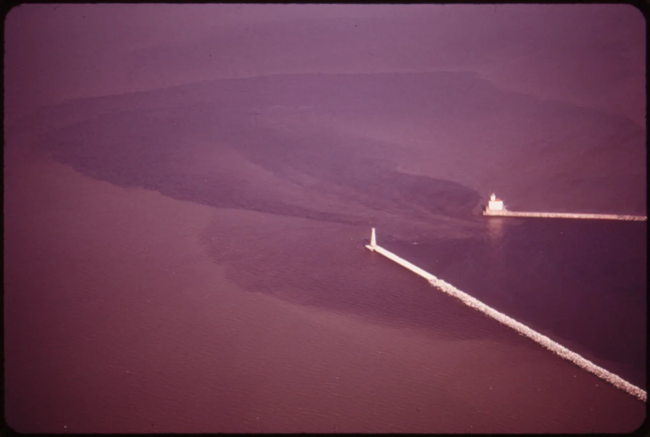 THE ST. LOUIS RIVER BASIN DISCHARGES ITS WATERS INTO LAKE SUPERIOR THROUGH THE DULUTH SHIP CANAL. THE RIVER WATERS... - NARA - 551600.jpg