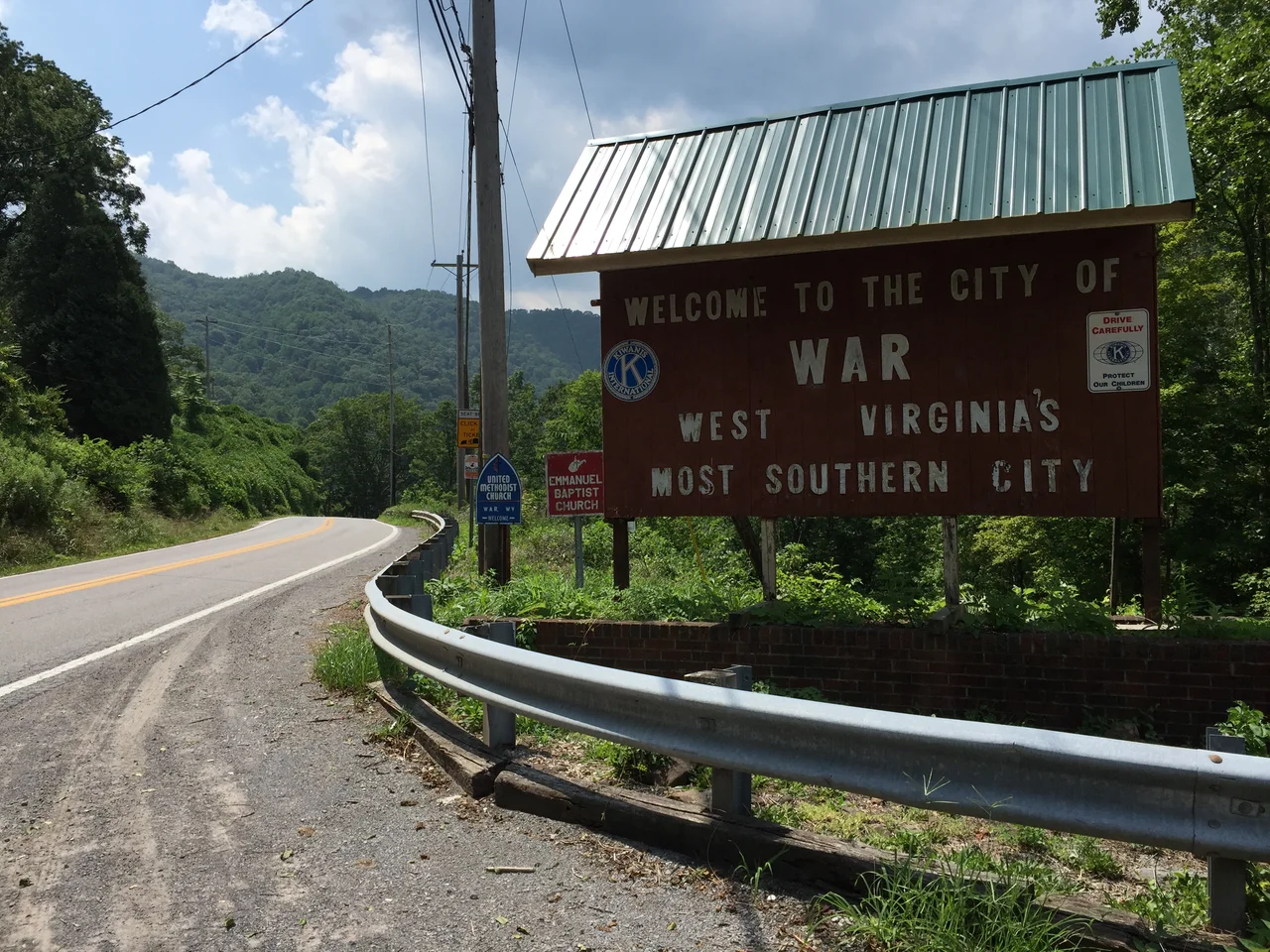 "Welcome to the City of War" sign along southbound West Virginia State Route 16 (Main Street) at Excelsior A Road (McDowell County Route 102/08) in War, McDowell County, West Virginia