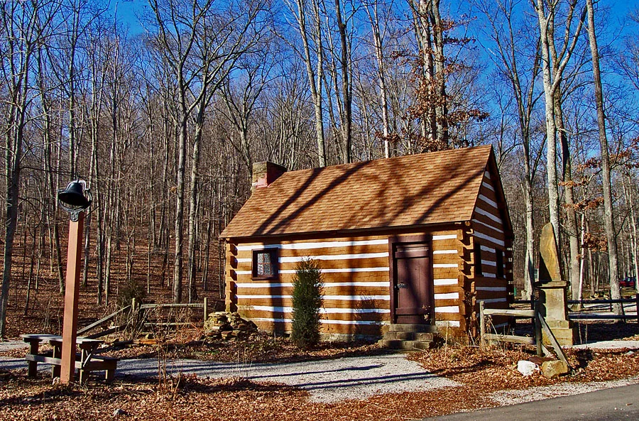 I decided to walk in Scioto Trail State Park south of Chillicothe, Ohio on this warm afternoon.  I also decided to photograph this log structure which I'd bypassed during previous visits. 
It's a replica of the first Presbyterian church built in the 
area. According to data I found online, it was opened in 1798.

"This plain log structure gives testimony to the simple lifestyle of early Ohioans."--quoting the park website.