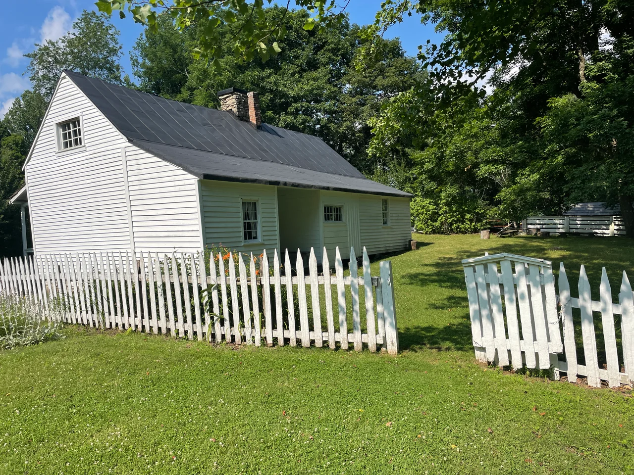 The restored Johnson Farm in Bedford County, Virginia, occupied by the Johnsons from 1854 to the early 1940s. It is one of the only remaining buildings from the community that flourished in the Peaks of Otter area. It existed as a four-room log cabin when John T. Johnson bought the farm in 1852.