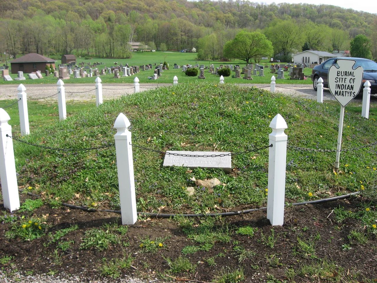 Burial mound containing the mass grave of those killed in the Gnadenhutten massacre, located in the cemetery at Gnadenhutten, Ohio, United States.