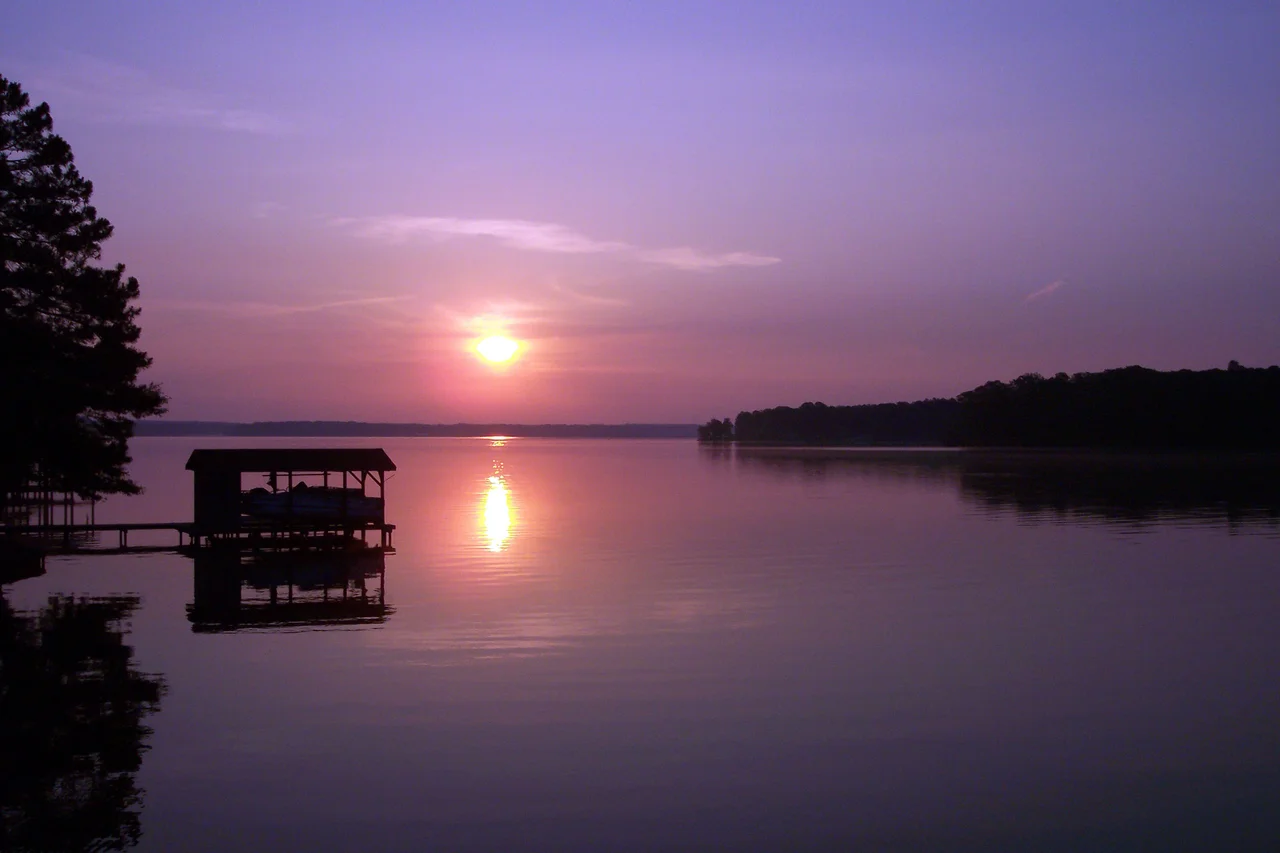 Lake Gaston, at dawn, 2007. 
This picture, taken from the Old Bridge Point subdivision, on Hubquarter Creek, depicts an early sunrise.
"The date in the metadata is incorrect, due to not setting the camera date."