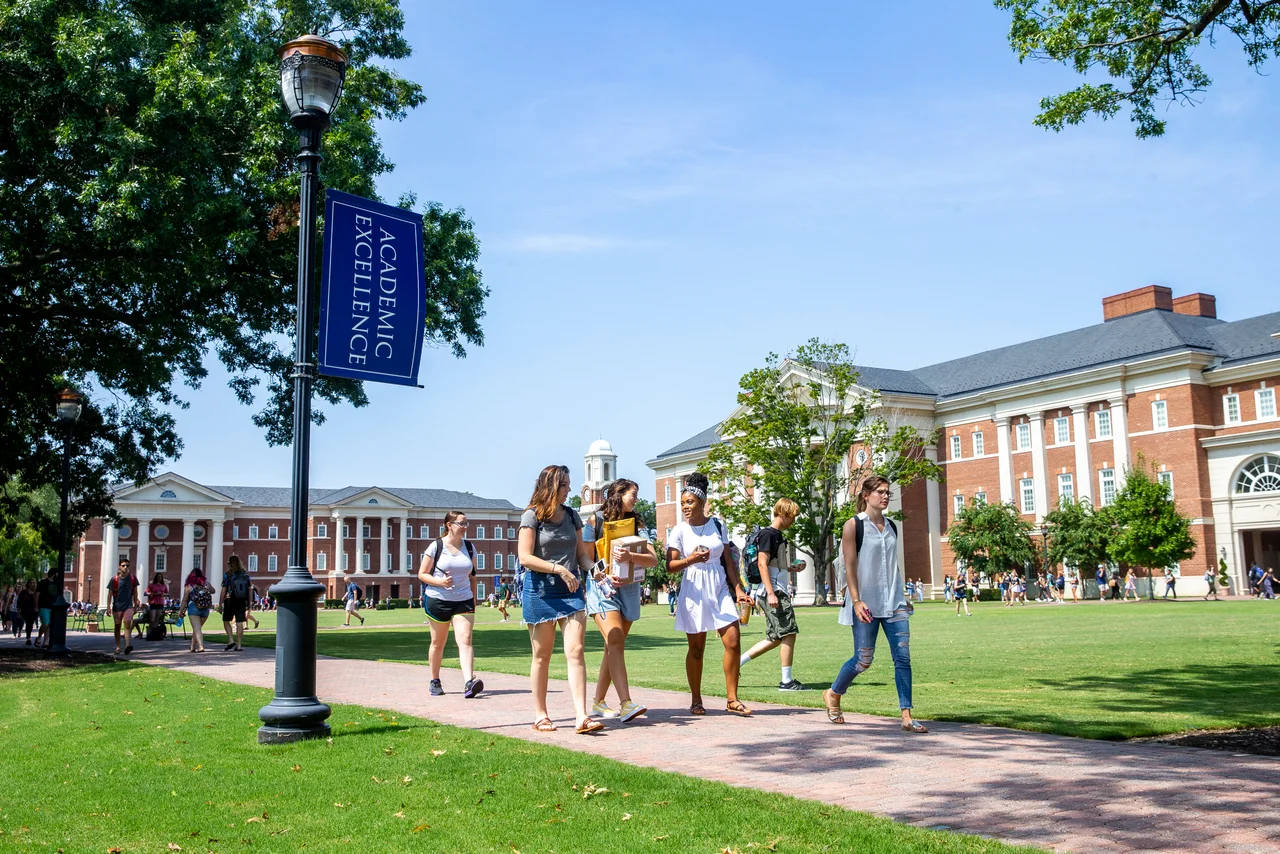 The Great Lawn of Christopher Newport University, featuring McMurran and Forbes academic buildings.