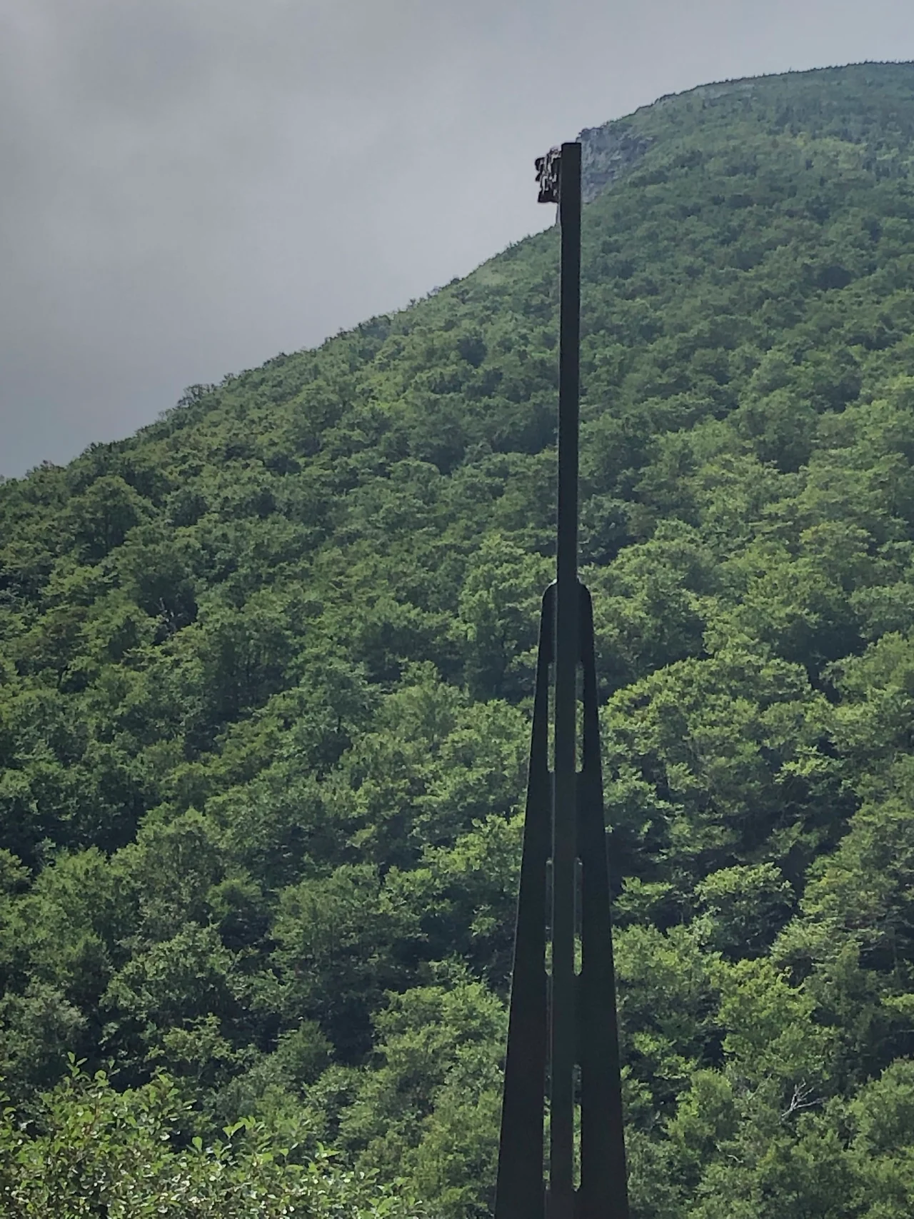 View of the Old Man of the Mountain via one of the "steel profilers" in Profiler Plaza, located in Franconia, New Hampshire.