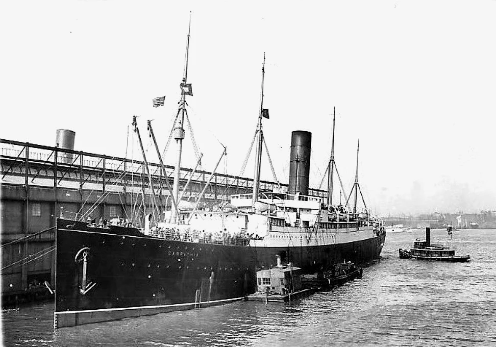 Photo of Carpathia docked at Pier 54 in New York City in 1912 following the rescue of the survivors of the Titanic. At the time this photo was taken, all third class passengers were still aboard Carpathia. 
Anyone with a first or second class ticket was able to leave a ship at the line's docks in New York; those who had third class or steerage tickets and were not US citizens were taken to en:Ellis Island after the other passengers left the ship at the pier.