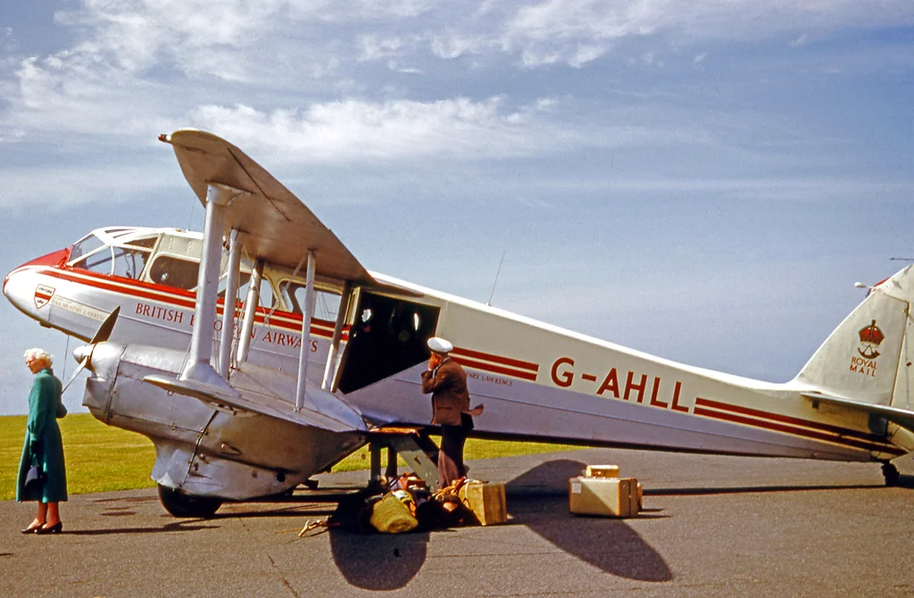 De Havilland DH.89A Dragon Rapide G-AHLL of British European Airways at St Mary's airfield, Scilly Islands, UK, in 1958