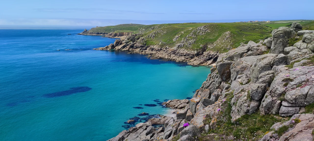 Looking down to Porthchapel beach and onto Gwennap Head
