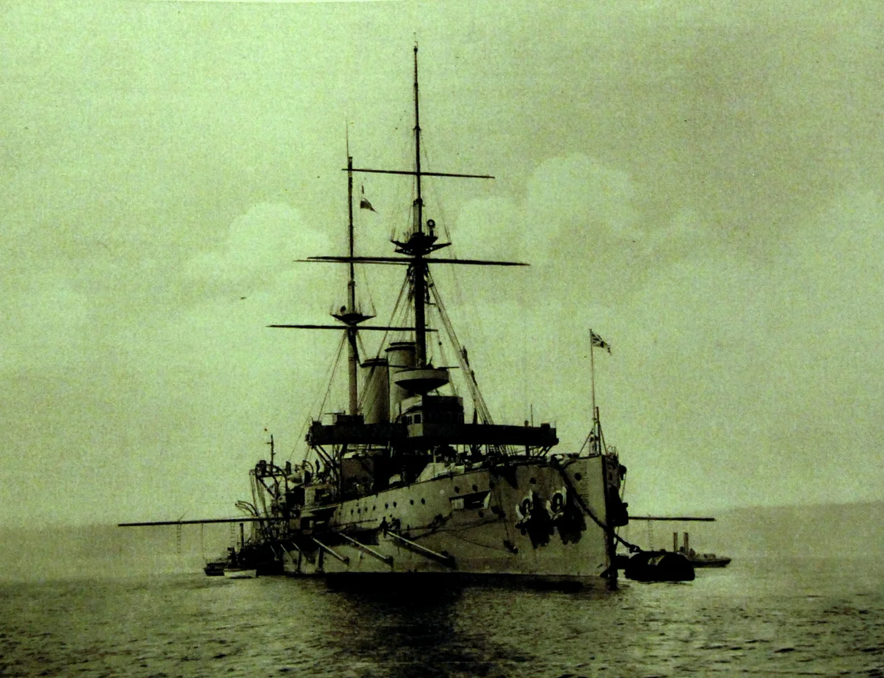 Lot 3447-6: Royal Navy battleship HMS Formidable, starboard bow view. On January 1, 1915, she was sunk by two German torpedoes while performing exercises in the English Channel. Halftone image from the Booklet “The Great War in Pictures” showing the activities of the German armed forces during World War in 1915. These were intended for propaganda purposes. Published by “Deutscher Uberseedienst”, Berlin, Germany. Edited by Jos. Schumacher, published by Georg Stilke. (2015/10/16).