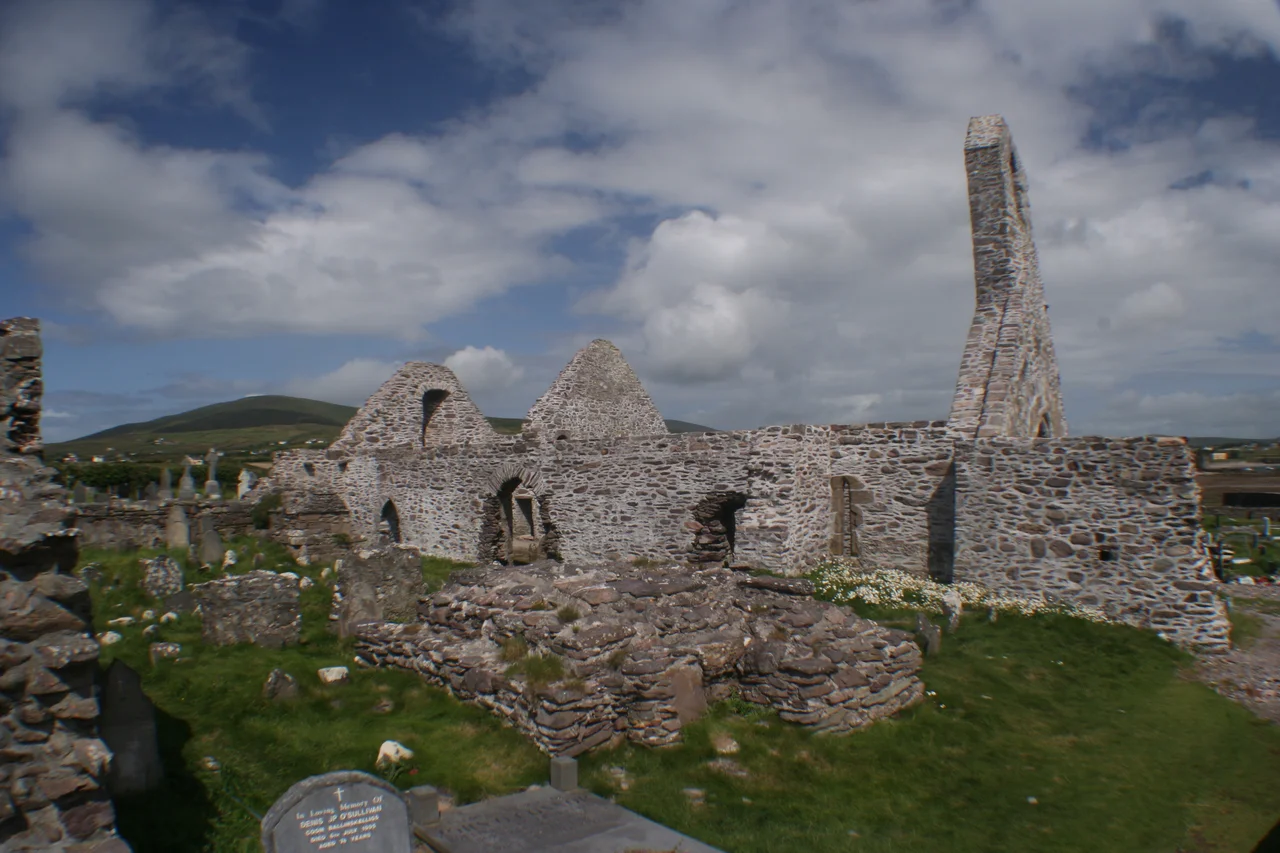 Aerial view of Ballinskelligs Priory and seawall.