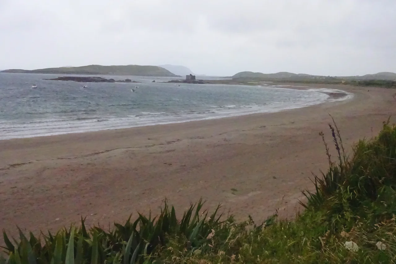Aerial view of Ballinskelligs Priory and seawall.