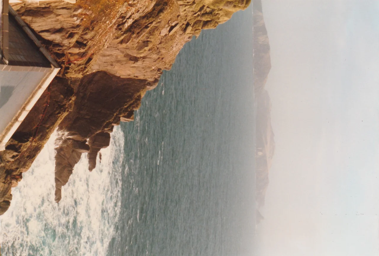 Lighthouse and associated buildings. Looking towards Inishnabro (Inis na Bró) to left and Inishvickillane to right