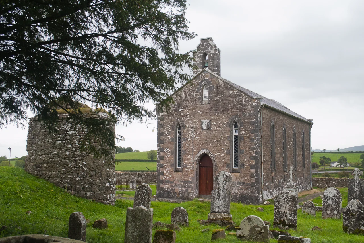17th-century fortification (left) and 19th-century St. Ciaran's Church (right).