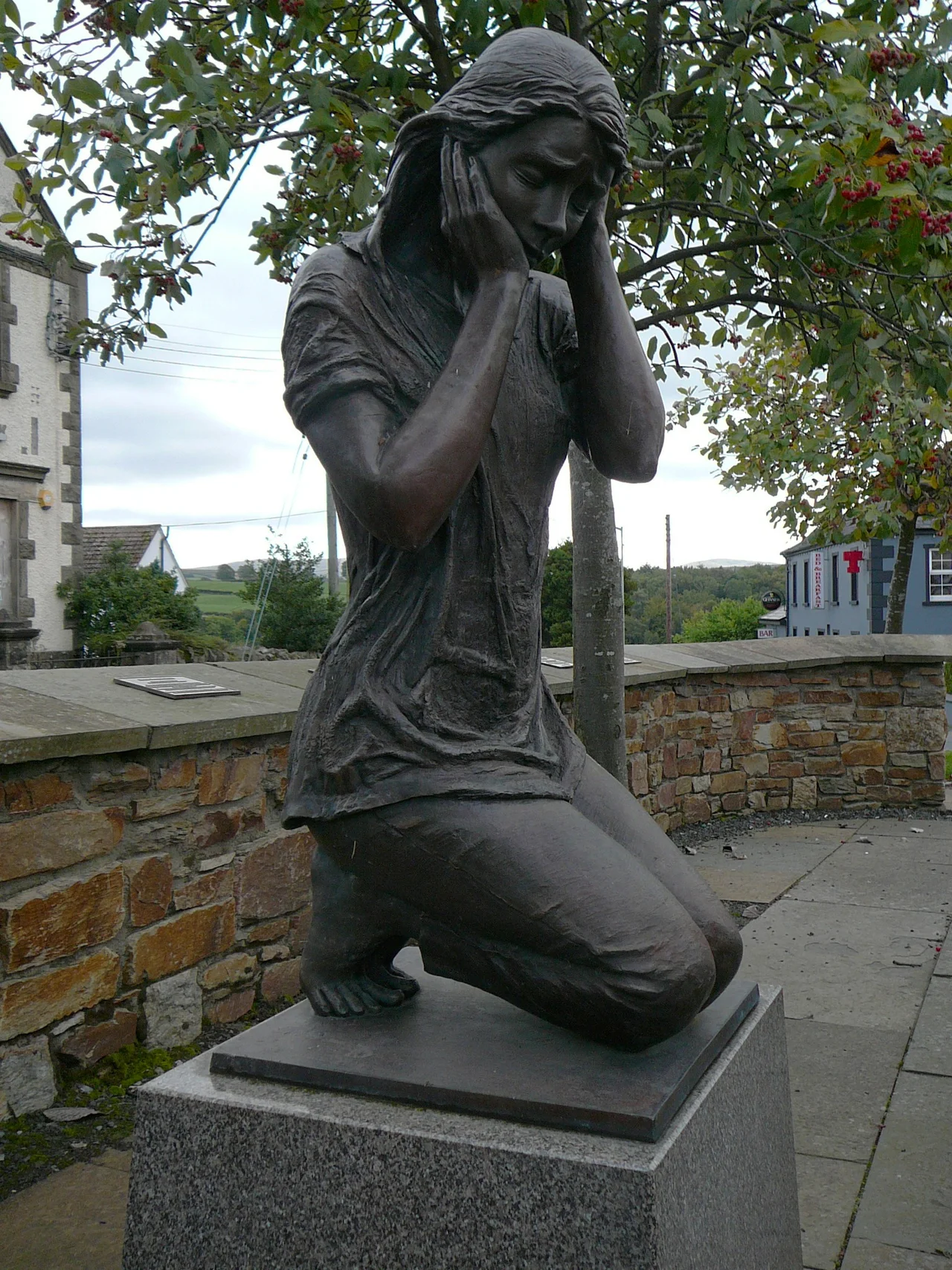 Claudy bombing memorial statue created by sculptor Elizabeth McLaughlin