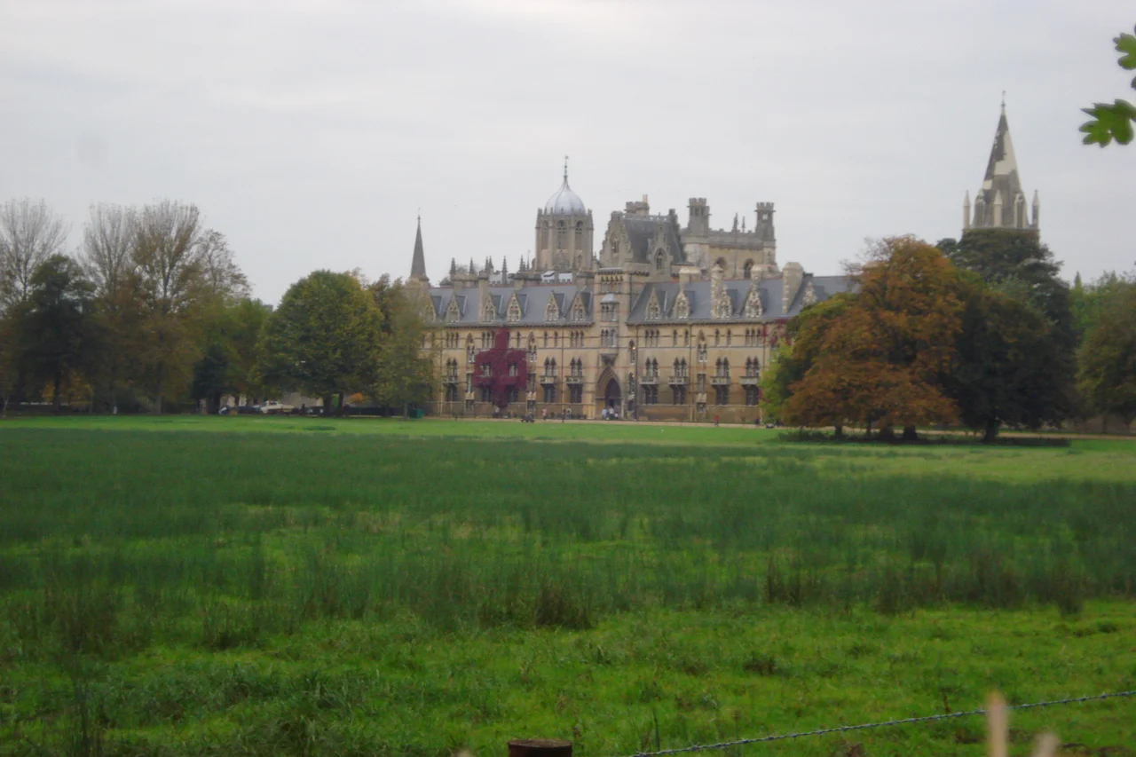 View of Christ Church, Oxford across Christ Church Meadow from bank of the River Cherwell