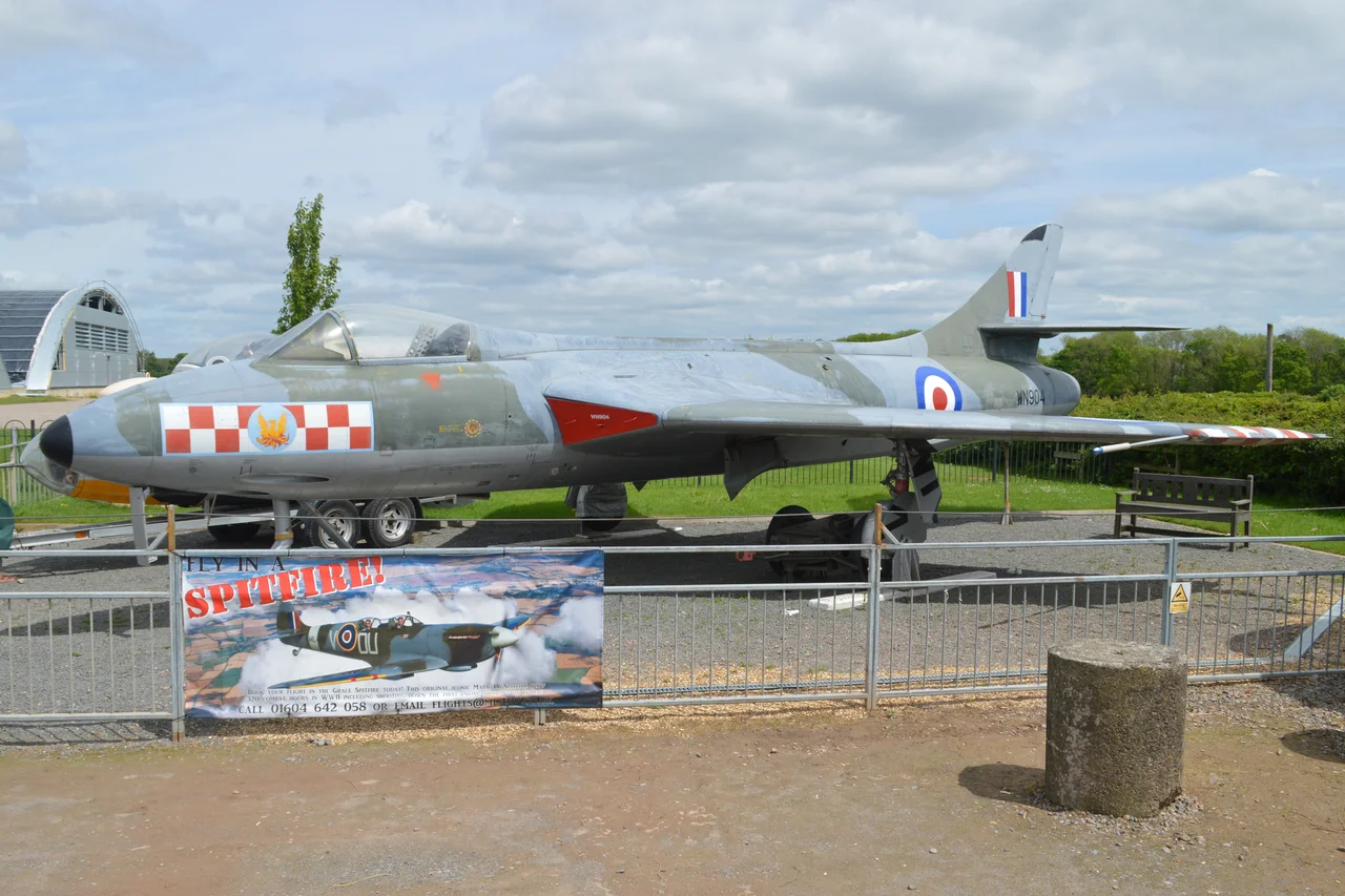 c/n S4/U/2912.
Built 1954.
British military serial WN904.
Among the 1,972 Hunters built, the F.2 was a rare mark. It was powered, along with the F.5, by the 8,300lbf Armstrong Siddeley Sapphire 101, instead of the Rolls-Royce Avon used in all other marks of Hunter. 
Built by Armstrong Whitworth at Coventry, only 45 were produced and this is now the only surviving example.
Delivered to 257sqn at Wattisham in September 1954, she remained with the unit until severely damaged in January 1956. Although repaired, she was then stored until 1958 when she went to the Melksham School of Technical Training as ‘7544M’.
In 1974 she was donated to the Imperial War Museum collection at Duxford, but was later loaned out to serve as a gate guard at Waterbeach Barracks, the former RAF Waterbeach. 
She is now painted in 56sqn markings and is on permanent display at the Sywell Aviation Museum.
Sywell Aerodrome, Northamptonshire, UK.

21st May 2017