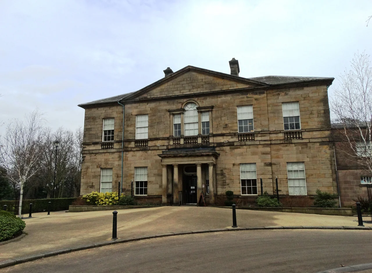 Clifton House, built in 1783, is a Grade II* listed building designed by John Carr of York. Ashlar sandstone, graduated slater oof. 2 storeys, 5 x 6 bays; symmetrical facades. Open stone porch with paired Doric columns,