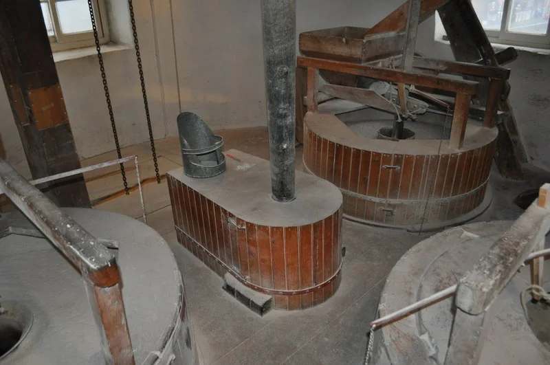 Maud Foster Mill - Three Stones, near to Boston, Lincolnshire, Great Britain.
The mill powers three stones with its five powerful sails. Two are millstone grit (Derbyshire) and one Fench burr (for white flour). Two were in action today. The central shaft runs down to the floor below and runs the governor.