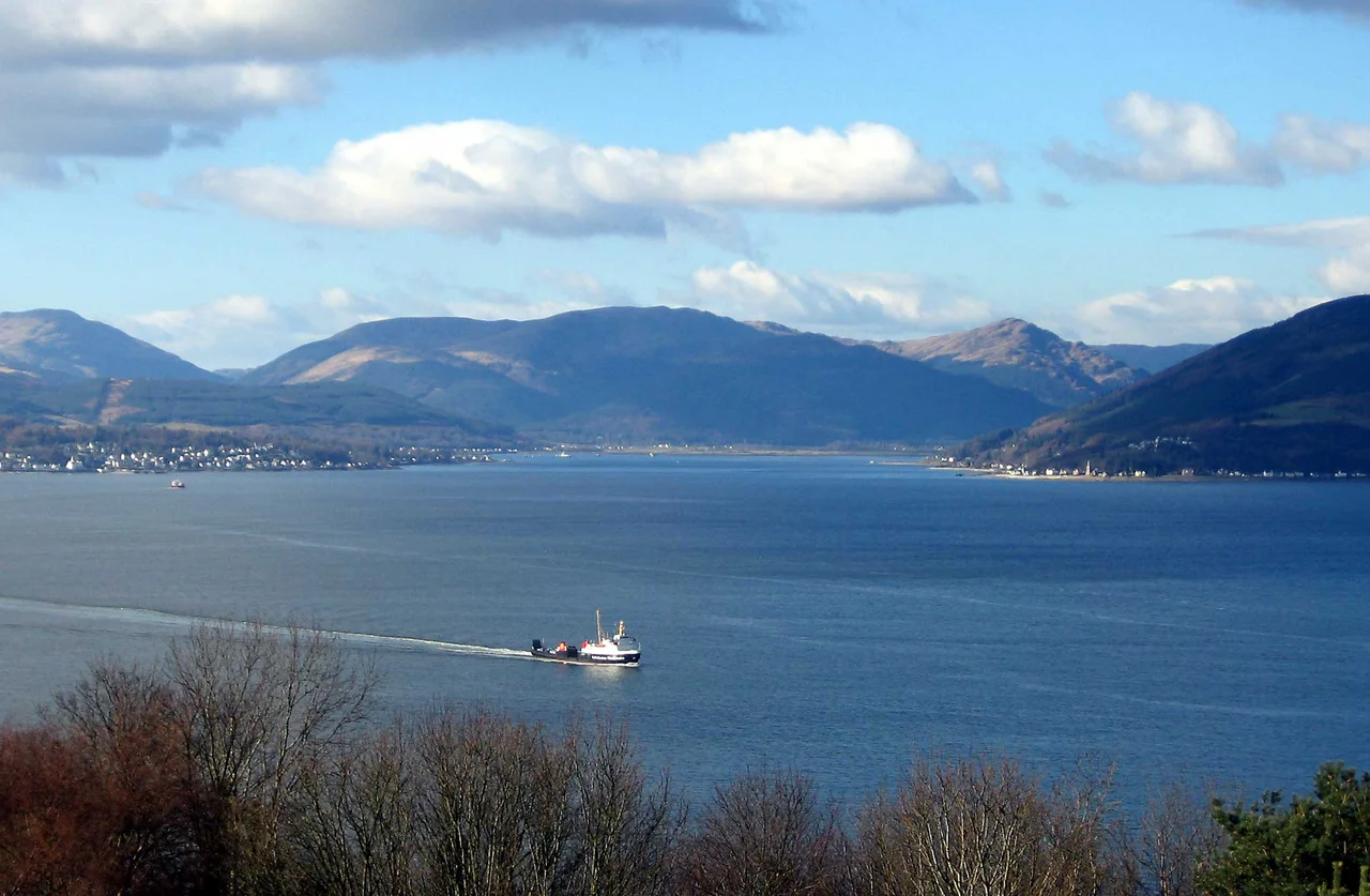 The Holy Loch seen from Tower Hill, Gourock across the Firth of Clyde in Scotland, with the ferry MV Saturn crossing from Dunoon.
photograph taken ion 20 February 2006 by User:Dave souza.
Any re-use to contain this licence notice and to attribute the work to User:Dave souza at Wikipedia.