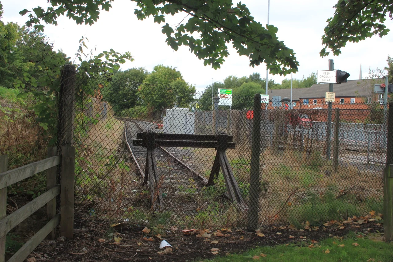 The stop blocks at Strand Road mark the end of the line for the Ribble Steam Railway. The track on the right of the fence leads to Preston station and the main line rail network.