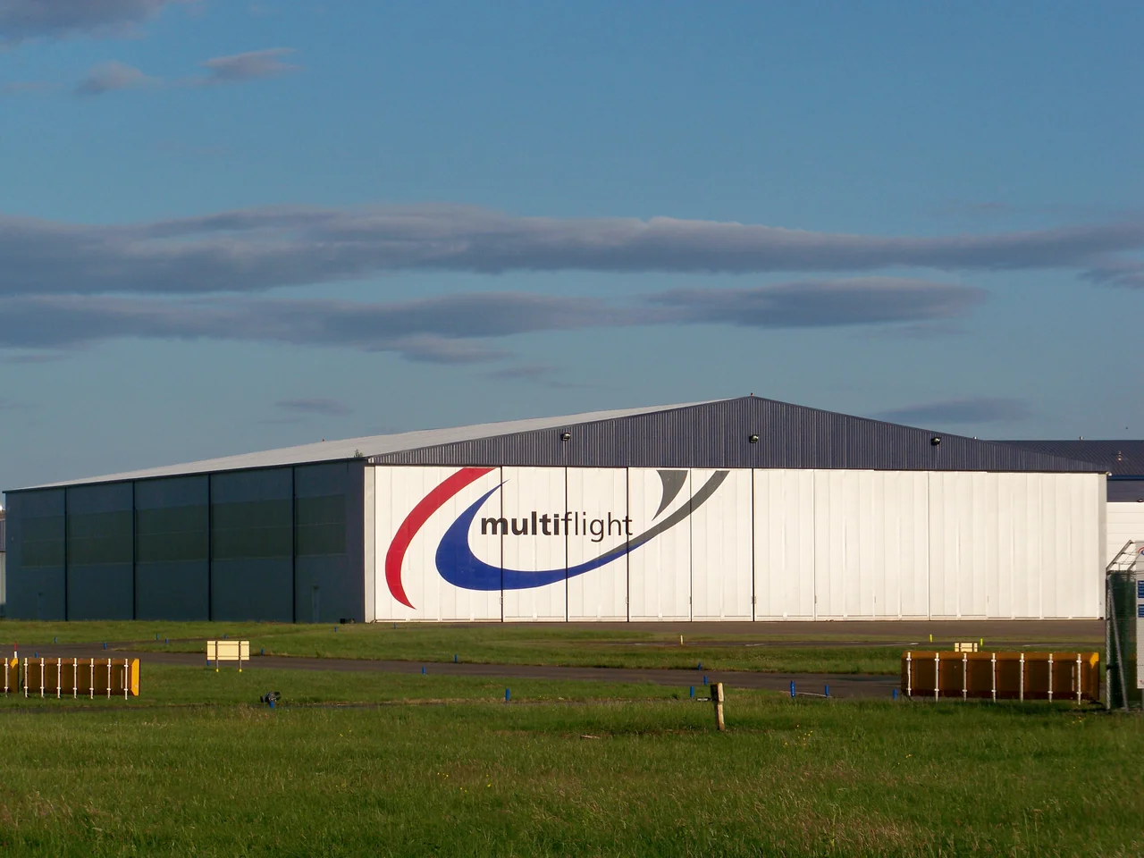 A hangar owned by Multiflight, flight training school, situated at Leeds Bradford International Airport, Leeds, West Yorkshire, UK.  July 2009.