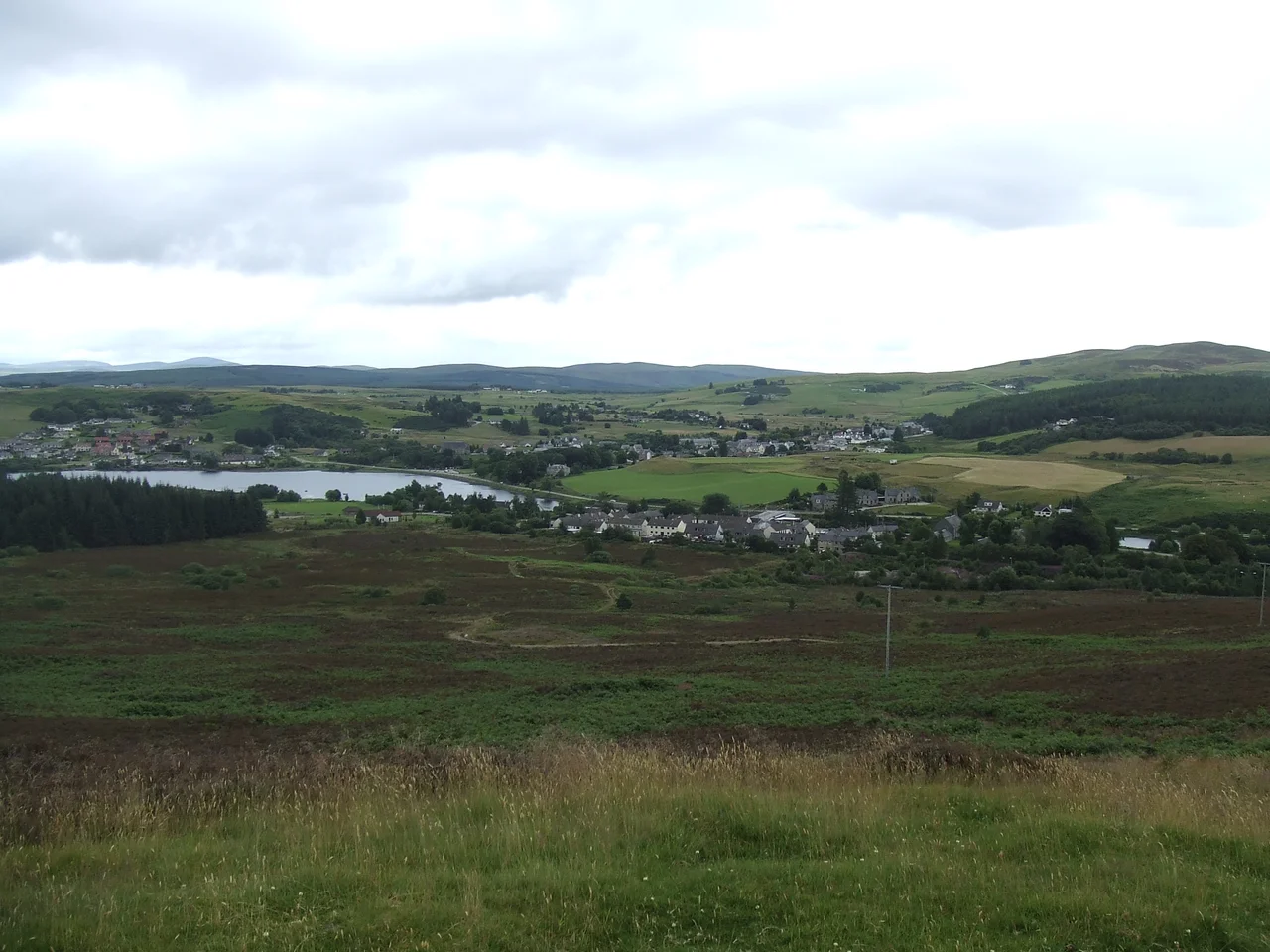 This is a photograph of the village of Lairg, Scotland shot from the top of nearby Ord Hill.