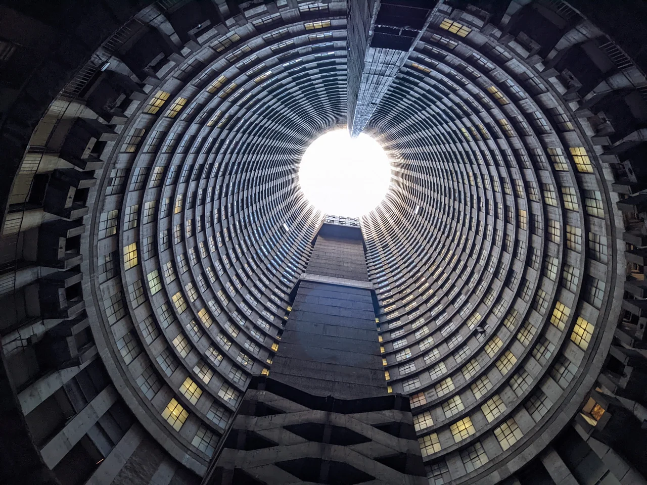 The iconic inner "core" of the Ponte City apartment complex, taken from the lowest level during the daytime and looking up at all 55 floors.