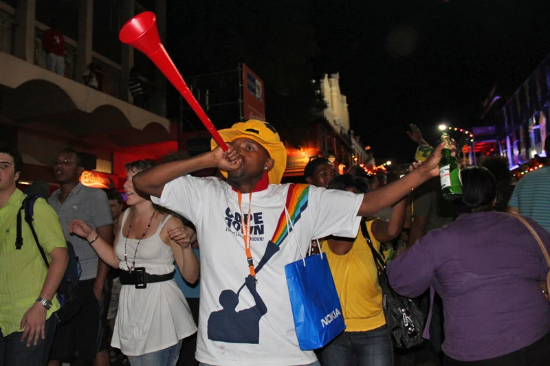 Man blowing a vuvuzela, Cape Town, South Africa