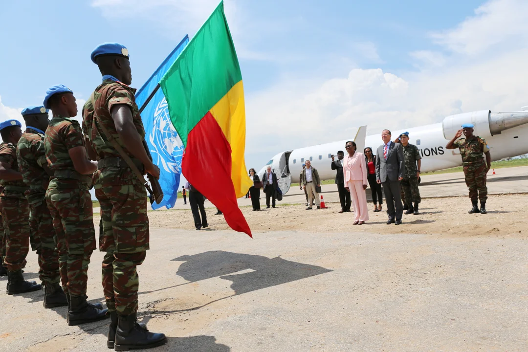 The Special Representative of the UN Secretary-General in the D. R. Congo, Martin Kobler, on his arrival in Kalemie, Katanga province, to officiate a medal parade ceremony organized by the Beninese contingent of MONUSCO Force. Next to the SRSG is the ambassador of Benin to the D. R. Congo who also travelled to the area to witness the event. Photo: MONUSCO/Myriam Asmani
Le Représentant spécial du Secrétaire général de l’ONU en R.D. Congo, Martin Kobler, à son arrivée à Kalémie, province du Katanga, pour présider une cérémonie de remise de médaille organisée par le contingent béninois de la Force de la MONUSCO. Le Représentant spécial avait à ses côtés l’ambassadrice du Benin en R. D. Congo, elle aussi ayant fait le déplacement pour être témoin de l’événement. Photo : MONUSCO/Myriam Asmani.