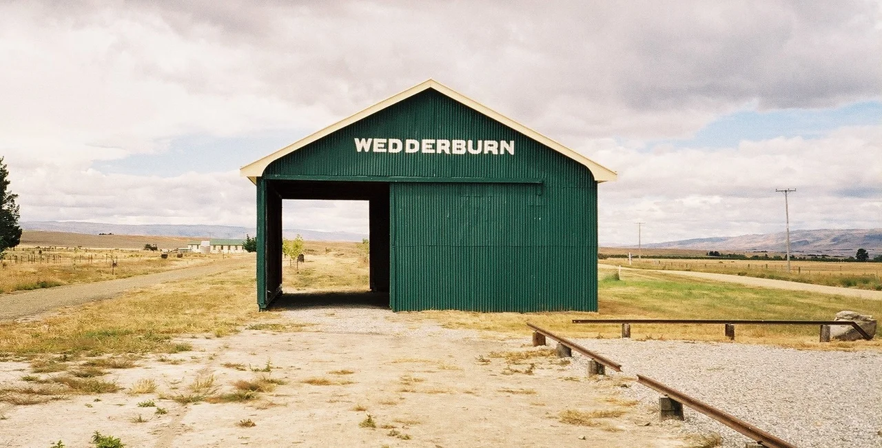Wedderburn Shed, Otago
Author: User:Velela.
Location: Wedderburn, Otago, New Zealand
Source: Personal photograph taken by Author December 2004
Description: The Wedderburn Goods Shed on the now abandoned stretch of Otago rail line.
Technical data: Pentax MZ-5 camera.