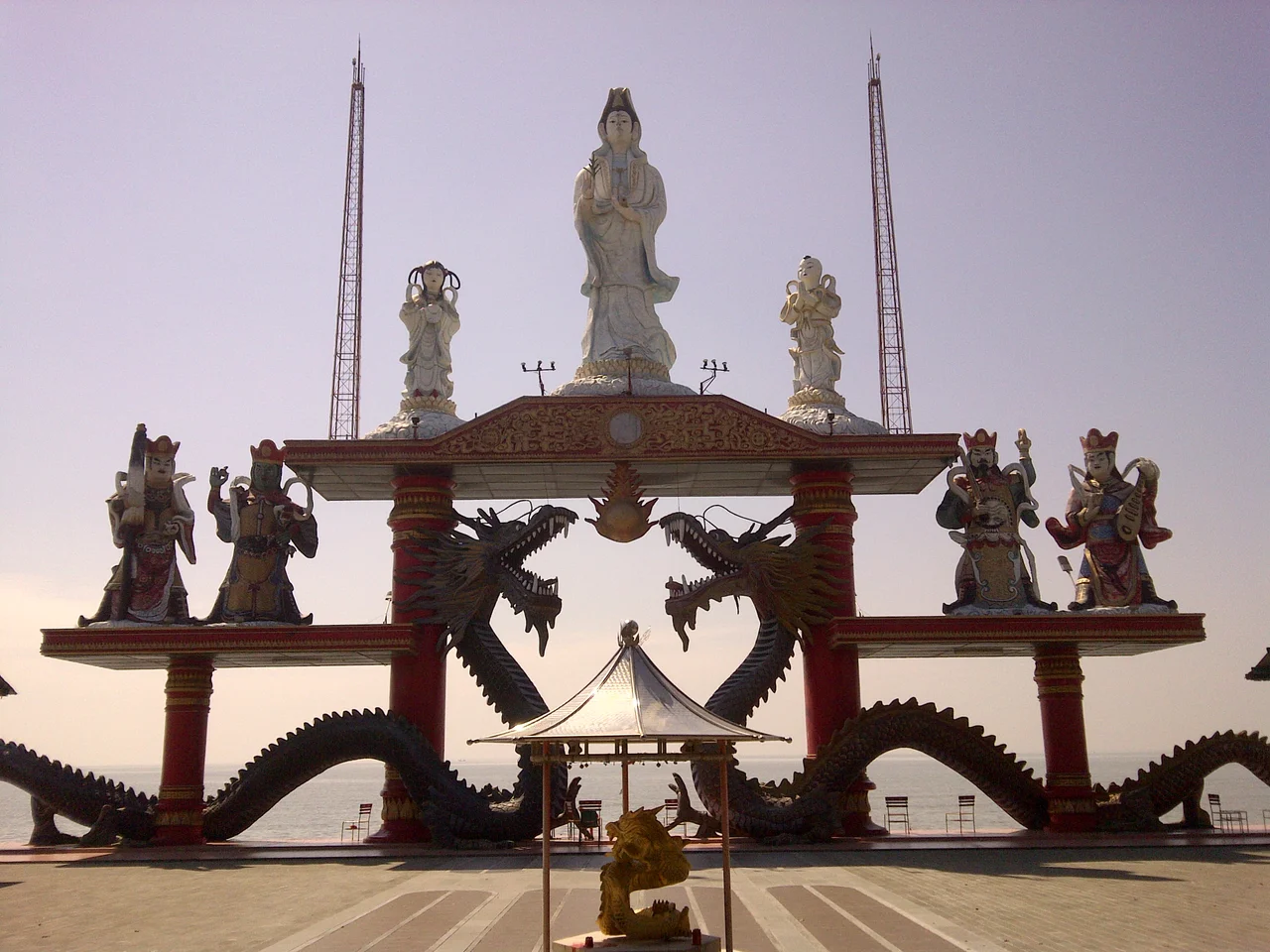 Guan Shi Yin Bodhisattva statue flanked by Nagakanya and Sudhana (top) / Bottom level shows 4 Heavenly Kings of Sanggar Agung Temple, Surabaya-Indonesia